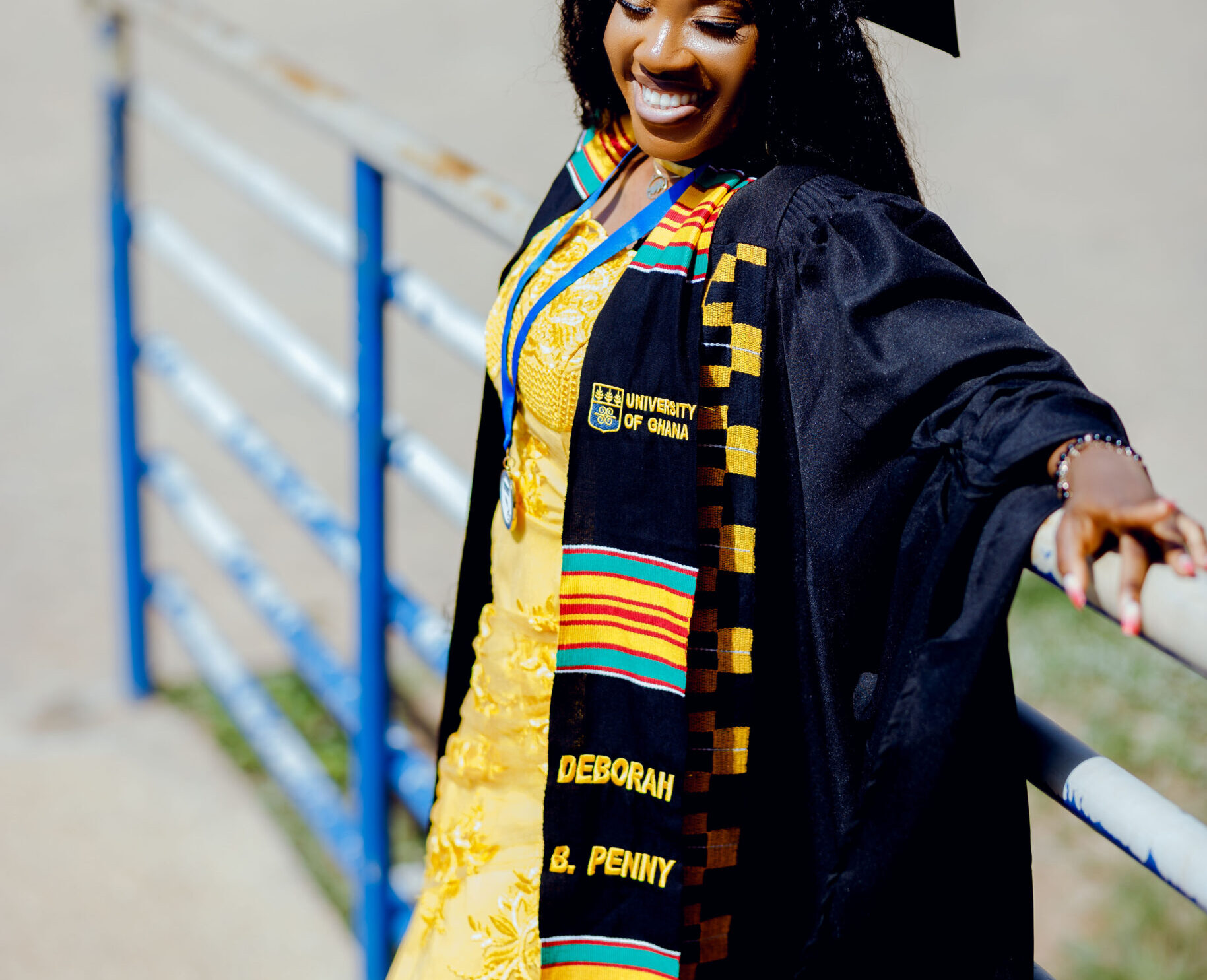 University of Ghana graduate wearing a custom Kente Graduation Stole